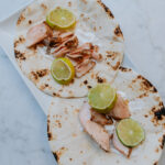 Easy salmon tacos on a plate.